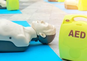 SM Image dummy doll laying on blue carpet